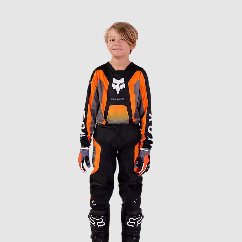 Polera Moto Niño 180 Ballast Negro/Naranjo Fox